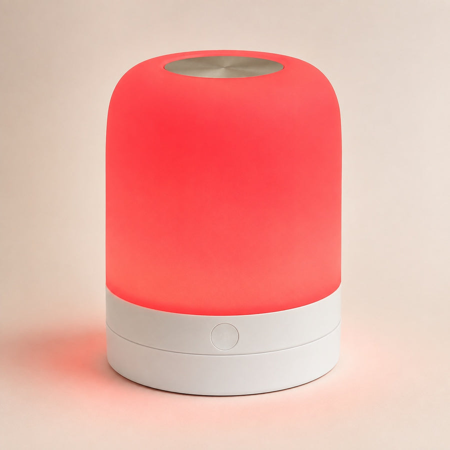 Red-mode bedside lamp with white base and silver touch panel on an ivory background.