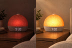 The same Rovelet clock in dim red evening mode and golden sunrise mode, shown side by side.
